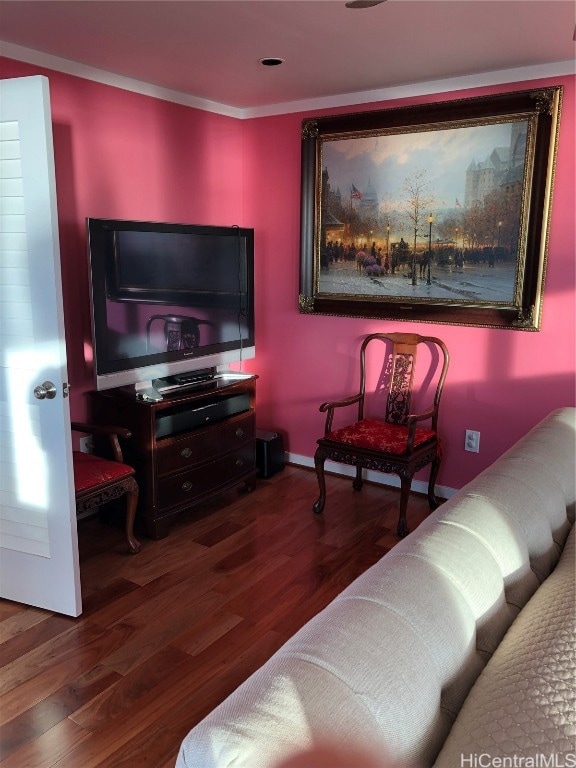 living room with ornamental molding and dark hardwood / wood-style flooring