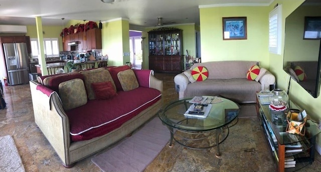 living room with ornamental molding