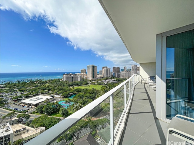 balcony featuring a water view