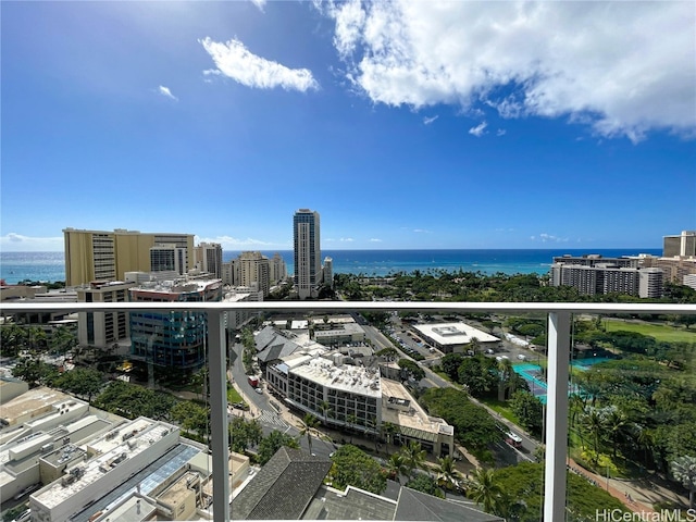 balcony featuring a water view