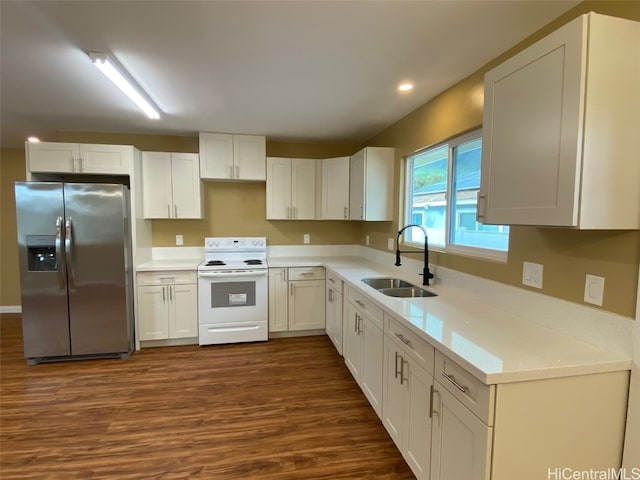 kitchen featuring dark hardwood / wood-style flooring, stainless steel fridge with ice dispenser, white cabinetry, white electric range, and sink