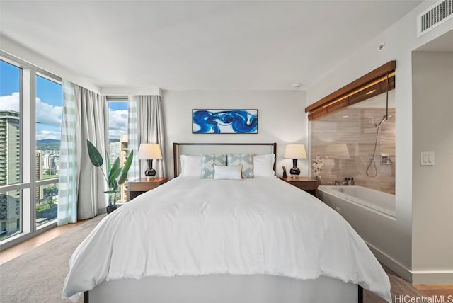 bedroom featuring hardwood / wood-style floors