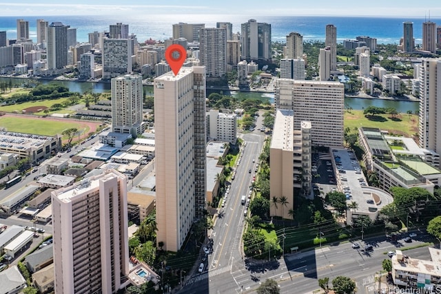 birds eye view of property featuring a water view