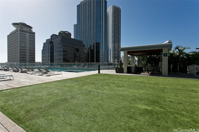 exterior space with a patio area and a community pool