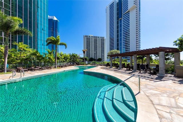 view of pool featuring a pergola and a patio area