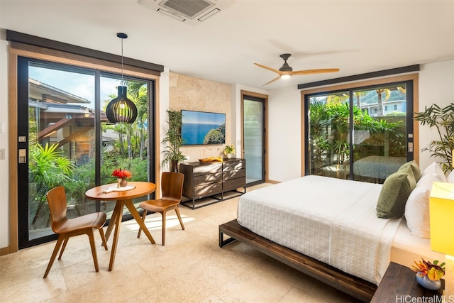 bedroom featuring access to outside and ceiling fan