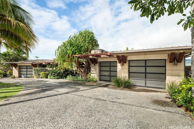 view of front of home with a garage