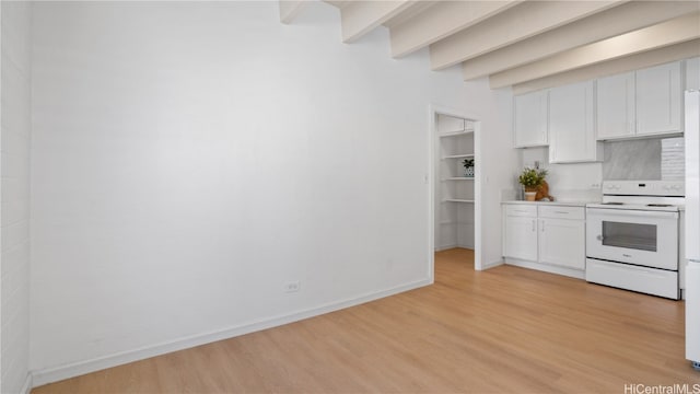 kitchen with white cabinetry, electric stove, beam ceiling, and light wood-type flooring