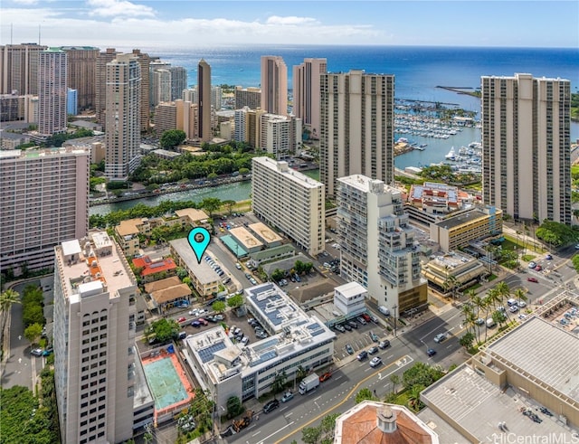 birds eye view of property featuring a water view