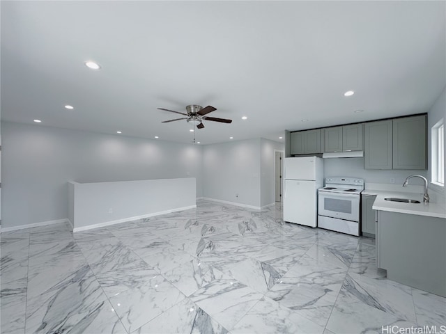 kitchen featuring white appliances, ceiling fan, sink, and gray cabinetry