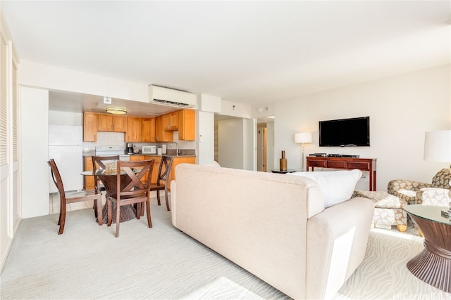 carpeted living room featuring a wall unit AC and sink