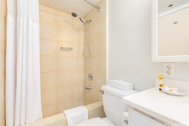 bathroom with vanity, a shower with shower curtain, and toilet