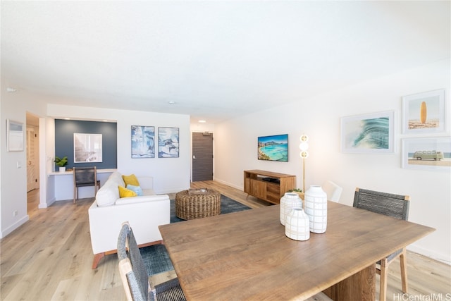 dining room featuring light wood-type flooring