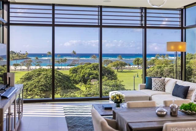 sunroom with a water view