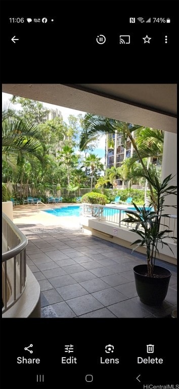 view of pool featuring a patio area