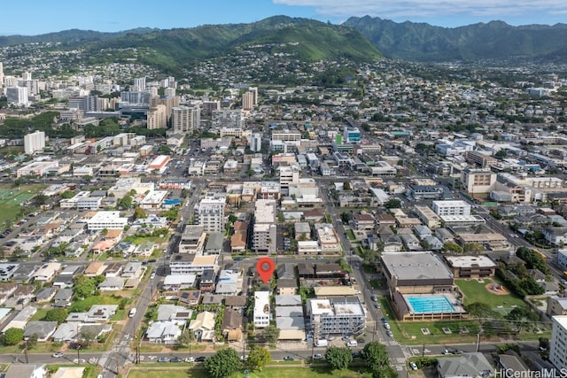 birds eye view of property featuring a mountain view