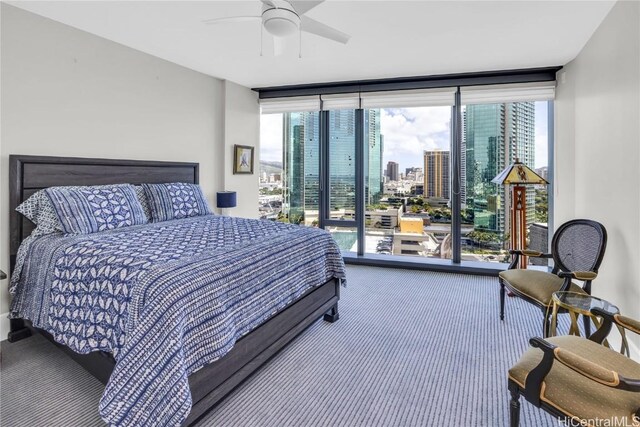 bedroom featuring floor to ceiling windows, carpet floors, access to outside, and ceiling fan