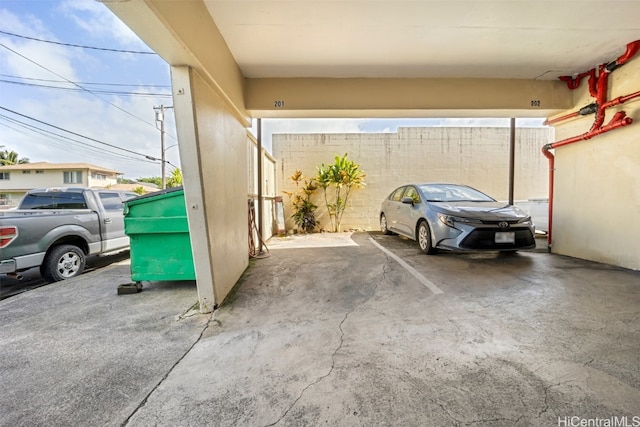 view of parking featuring a carport