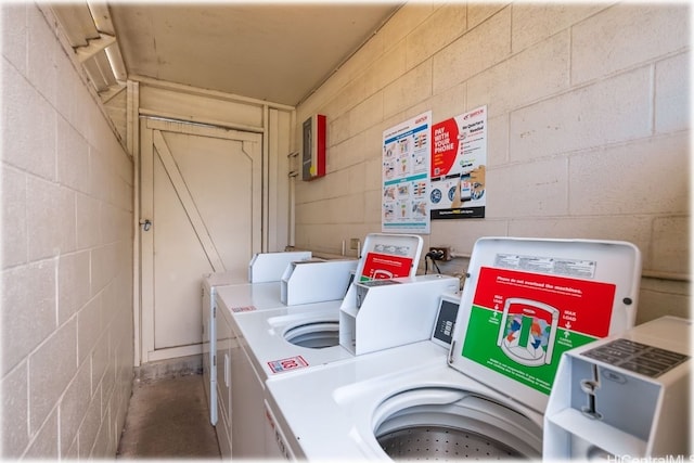 laundry area with washing machine and dryer