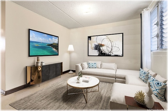 living room featuring a textured ceiling