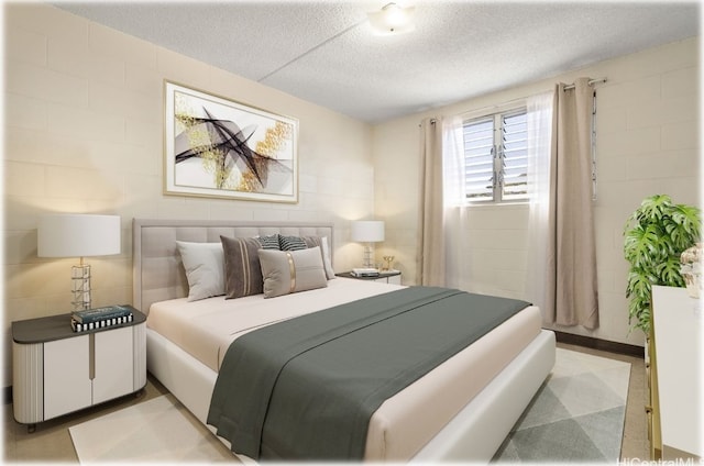 bedroom featuring a textured ceiling