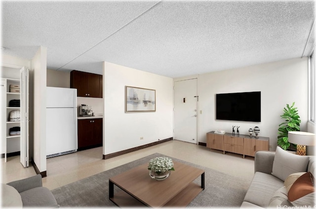 living room with a textured ceiling