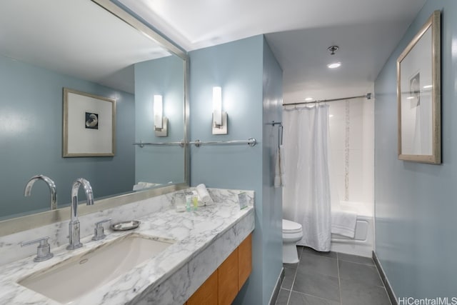 full bathroom with toilet, shower / tub combo with curtain, vanity, and tile patterned floors