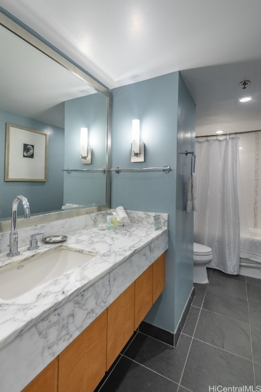 full bathroom featuring vanity, shower / bath combo, toilet, and tile patterned floors