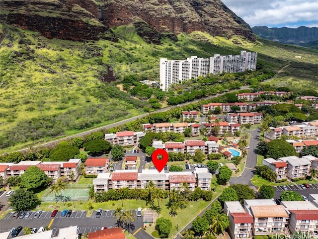 birds eye view of property featuring a mountain view