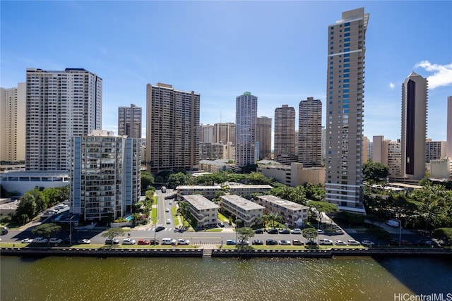 property's view of city featuring a water view