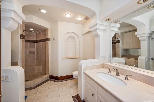2999 Makalei Pl, Honolulu, HI 96815 - bathroom with baseboards, toilet, tiled shower, vanity, and recessed lighting