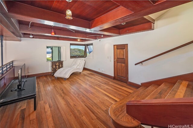 sitting room with beam ceiling, track lighting, wood ceiling, and hardwood / wood-style floors