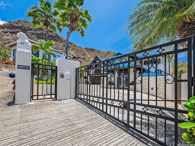 2999 Makalei Pl, Honolulu, HI 96815 - gate with a fenced front yard and a mountain view