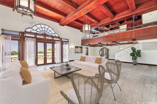 living room featuring light wood-type flooring, french doors, coffered ceiling, wooden ceiling, and beamed ceiling