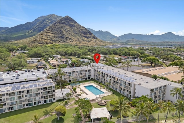 birds eye view of property featuring a mountain view