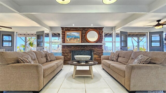 84-879 Moua St, Waianae, HI 96792 - tiled living room with ceiling fan, a healthy amount of sunlight, and beam ceiling