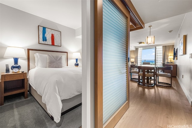 bedroom featuring hardwood / wood-style floors