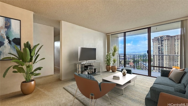 living room featuring light carpet, a textured ceiling, and floor to ceiling windows