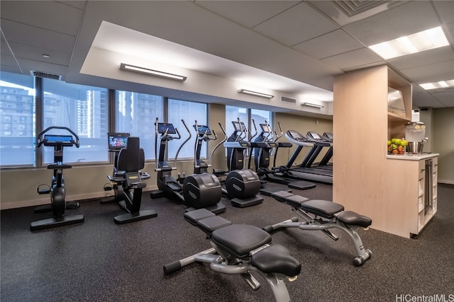 gym with a drop ceiling