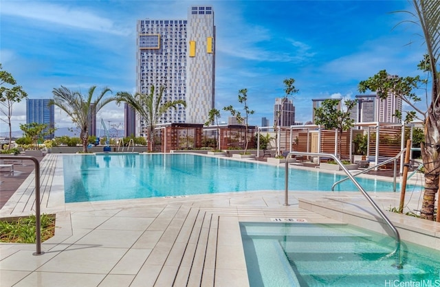 view of pool featuring a patio area