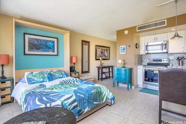 bedroom with a textured ceiling