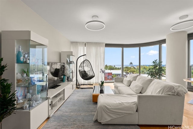 living room with floor to ceiling windows