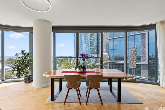 dining space featuring expansive windows