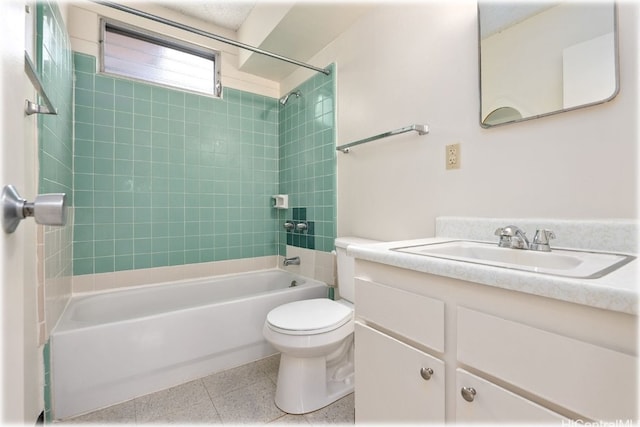 full bathroom featuring toilet, tiled shower / bath combo, and vanity