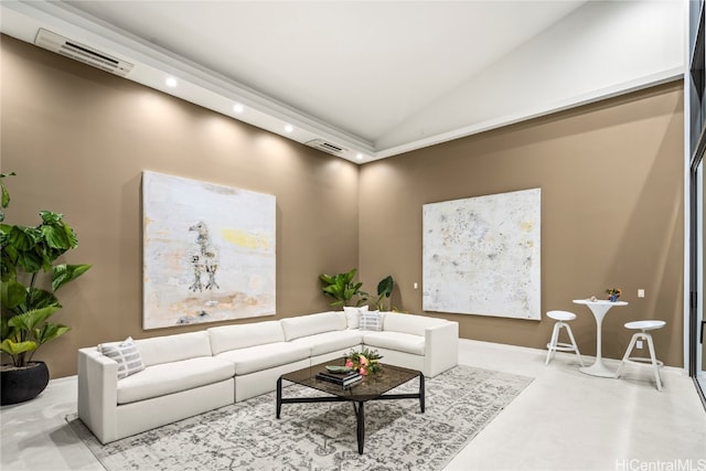 living room featuring vaulted ceiling