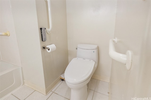 bathroom with tile patterned flooring and toilet