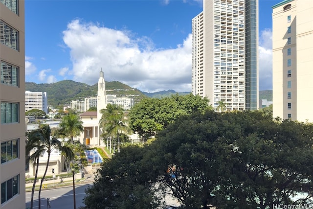 view of building exterior featuring a mountain view