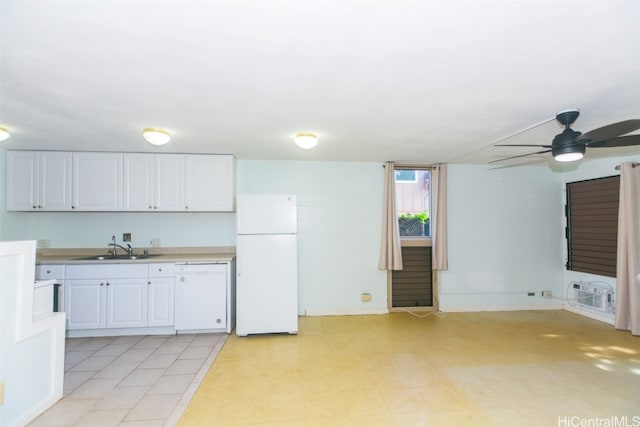 kitchen featuring white appliances, ceiling fan, sink, and white cabinets