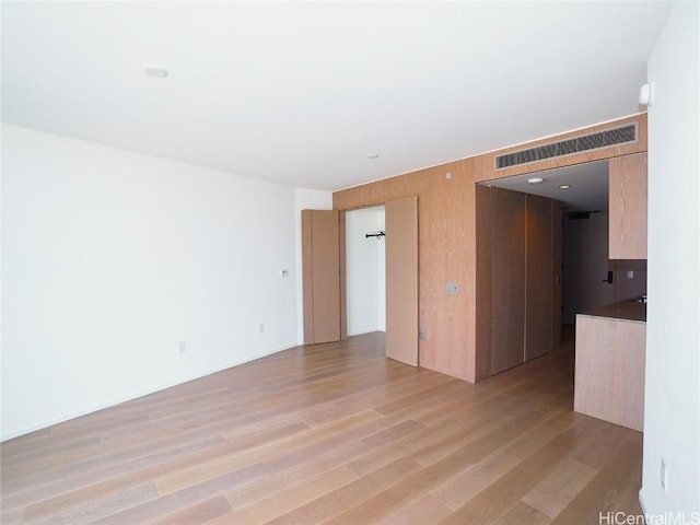 empty room with light wood-type flooring