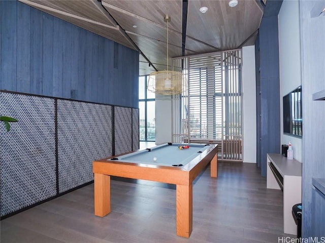 game room featuring floor to ceiling windows, dark wood-type flooring, and billiards